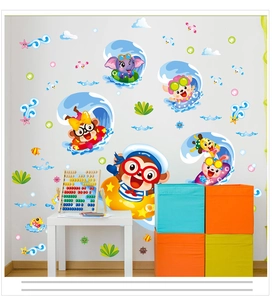 Vibrant cartoon animal wall stickers featuring a monkey and elephant surfing on a nursery wall