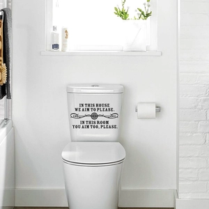 In This House English bathroom wall decal with humorous quotes on white toilet tank