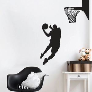 Vue détaillée du sticker mural silhouette de basket noir sur un mur blanc de chambre