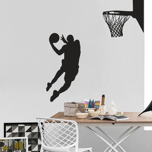 Détail d'un autocollant mural silhouette noire montrant un joueur de basket en action