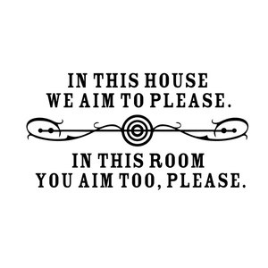 Close-up of In This House humorous English quote wall sticker for bathroom decor