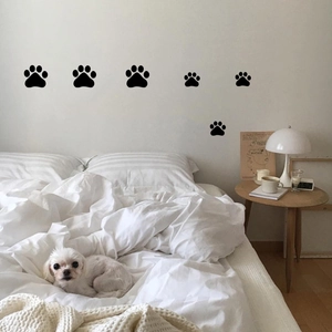 Set of 6 black cartoon dog paw print wall stickers for minimalist nursery room decor