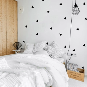Minimalist black triangle wall decals for bedroom decoration in Nordic geometric style