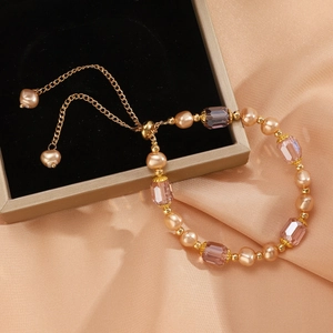 Baroque style pearl and lavender crystal adjustable bracelet with elegant gold finish