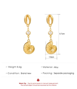Detail showing dimensions of gold alloy seashell and spiral conch drop earrings with pearl