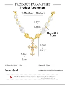 Detail of multi-layer cross pendant necklace with pearls and 45cm chain length