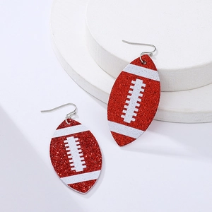 Sparkly red sequin football drop earrings with white stitching on minimalist stand