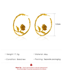Detailed specs of 5.2cm gold rose and thorn hoop earrings made of durable alloy metal