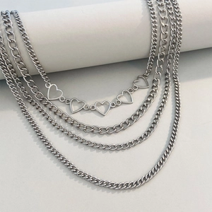 Silver multi-layer punk necklace with hollow heart links and chunky Cuban chains