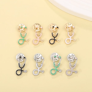 Doctor's stethoscope enamel pins in diverse colors with gold and silver finishes