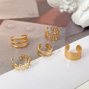 Five-piece vintage gold ear cuff set with leaf and layered hollow designs for non-pierced ears