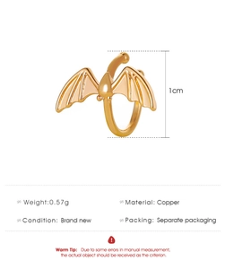 Detailed specs of the gold bat ear cuff made of copper showing 1cm size and 0.57g weight