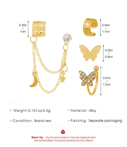 Größentabelle für goldene Schmetterling Ohrring Set mit Quastenkette und Stern Details