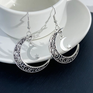 Retro hollow crescent moon earrings with star detail and silver finish fish hooks