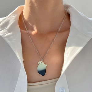 Luminous anatomical heart pendant necklace in gradient green and blue on silver chain