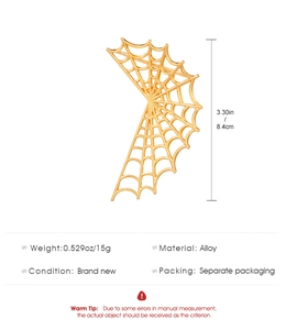 Detailed view of golden spider web ear cuff with size measurements and alloy material info