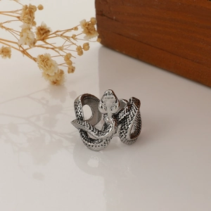 Vintage punk style snake wrap ring with detailed scale texture and silver metallic finish