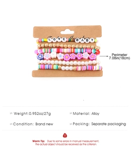 Detailed view of 6-piece bohemian stretch bracelet set with love baby letter beads