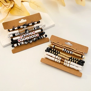 Detail view of colorful clay bead bracelets with BEST FRIEND letters on a display card