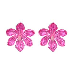 Vibrant rose pink orchid earrings with glossy floral metallic finish on white backdrop