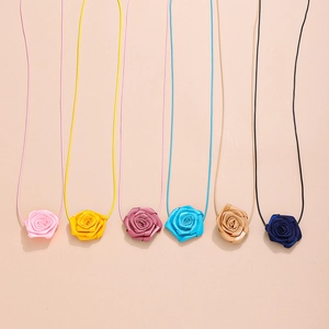 Set of vintage fabric rose flower choker necklaces in multiple vibrant colors for women