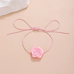 Adjustable light pink fabric rose choker necklace with elegant satin petals on ribbon
