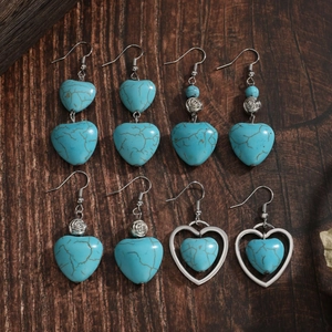 Set of four pairs of Bohemian turquoise heart earrings with vintage silver metal finish