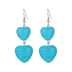 Bohemian silver earrings with heart-shaped turquoise stones in a vintage drop style