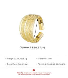 Detailed view of layered gold alloy ring featuring 2.1cm diameter and 3.7g weight specs