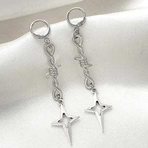 Gothic punk silver star drop earrings with barbed wire design on white silk background