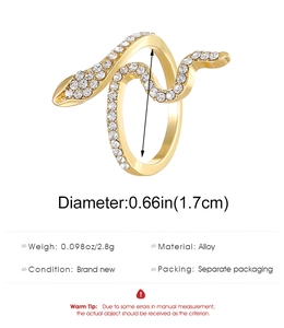 Detail showing dimensions of golden snake ring with cubic zirconia, weighing 2.8 grams