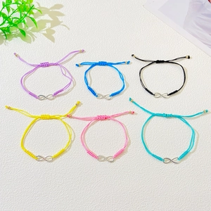 Set of six colorful woven infinity symbol bracelets with adjustable cord for couples