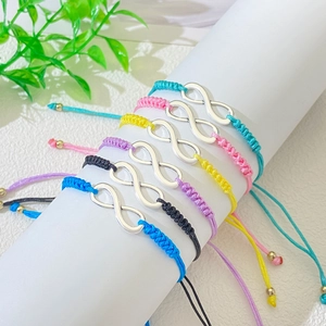 Infinity symbol woven friendship bracelets in colorful adjustable cord set for couples