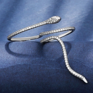 Detailed close-up of a silver snake ring featuring shimmering micro-pave cubic zirconia