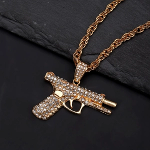 Hip hop gold pistol pendant necklace with sparkling zircons and a twisted rope chain