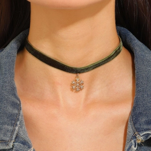 Green velvet choker necklace with gold snowflake pendant and crystals for Christmas