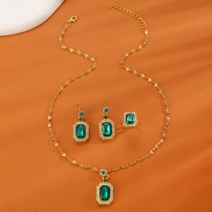 Elegant emerald jewelry set with necklace ring and earrings in 18k gold finish