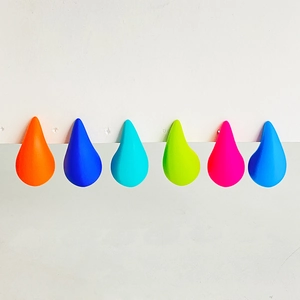 Set of six colorful waterdrop wall hooks in orange, blue, green and pink minimalist style