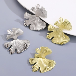 Fashion ginkgo leaf stud earrings in gold and silver finish with textured metal details