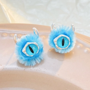 Sky blue fuzzy monster ear studs with single eye and small silver horns jewelry