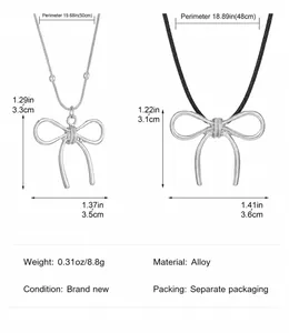 Tableau des tailles montrant les dimensions du pendentif nœud et la longueur du collier