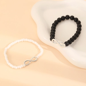 Juego de pulseras de cuentas Infinity minimalistas para parejas en blanco y negro