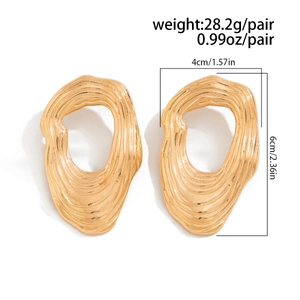 Detailed view of large gold irregular oval earrings with size and weight dimensions