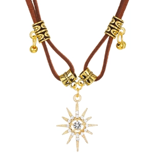 Brown leather choker necklace with starburst pendant and gold textured accents