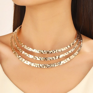 Three-layer gold metal choker with hammered texture and vintage minimalist design