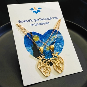 Creative hollow anatomical heart pendant necklaces in gold finish on Starry Night art card
