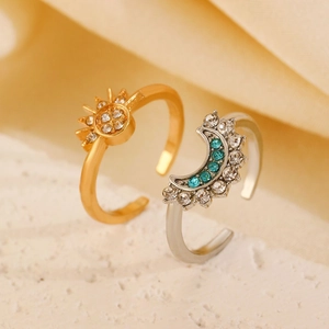Adjustable sun and moon ring set featuring gold finish and sparkling crystal inlays