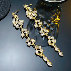 Elegant vintage gold leaf tassel earrings with sparkling cubic zirconia for bridal weddings