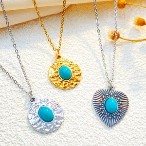 Vintage bohemian turquoise pendant necklace set with sunburst geometric textures