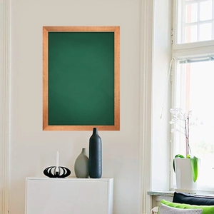 Green chalkboard with light wood frame for wall hanging in home office or school